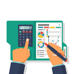 Businessman Holding a Pen With Calculator and Financial Tables